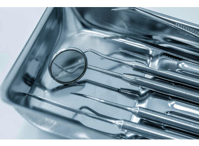 Article_image_stock-photo-dental-instrument-set-in-metal-tray-orthodontist